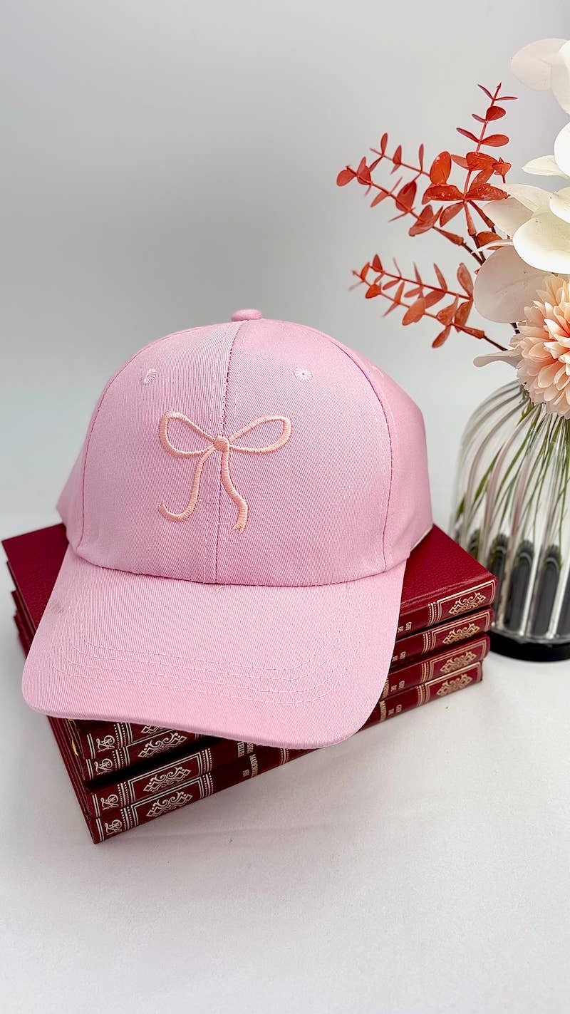 Denim pet met geborduurde strik