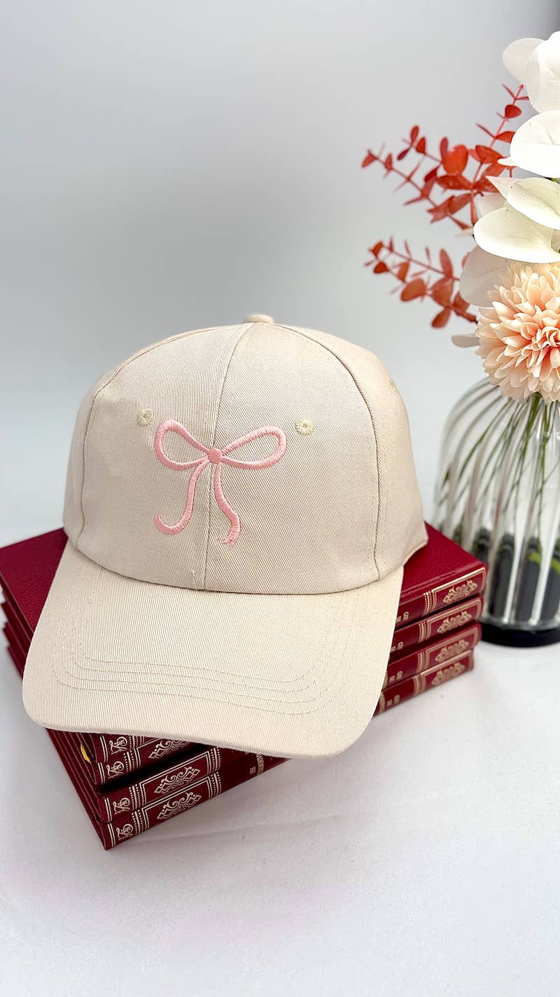 Denim pet met geborduurde strik