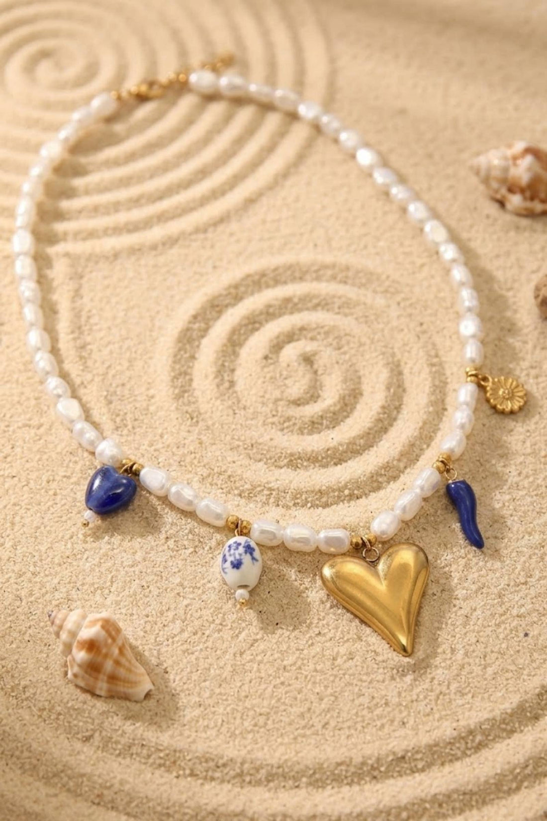 Parelketting met hartbedel – blauw