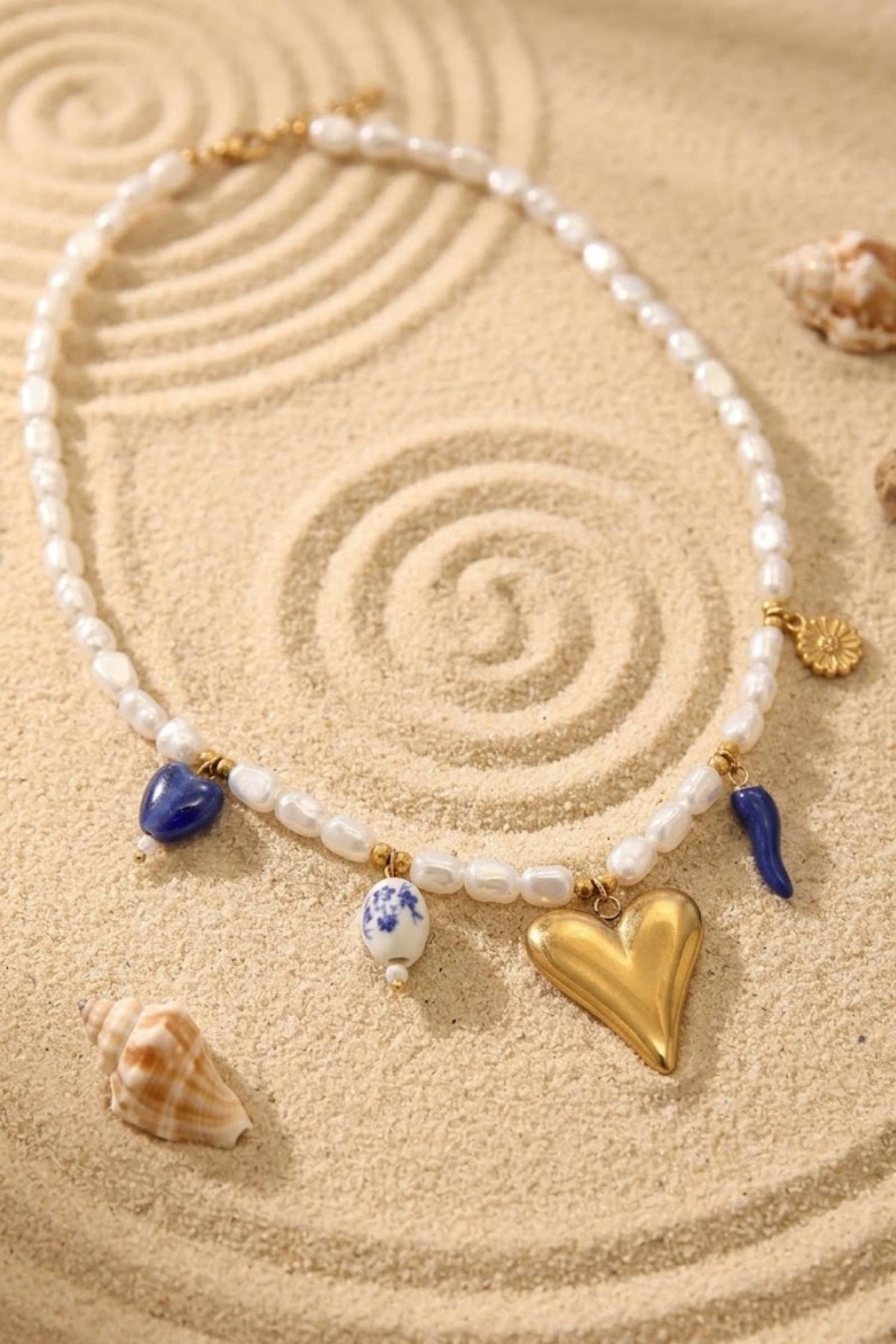 Parelketting met hartbedel – blauw