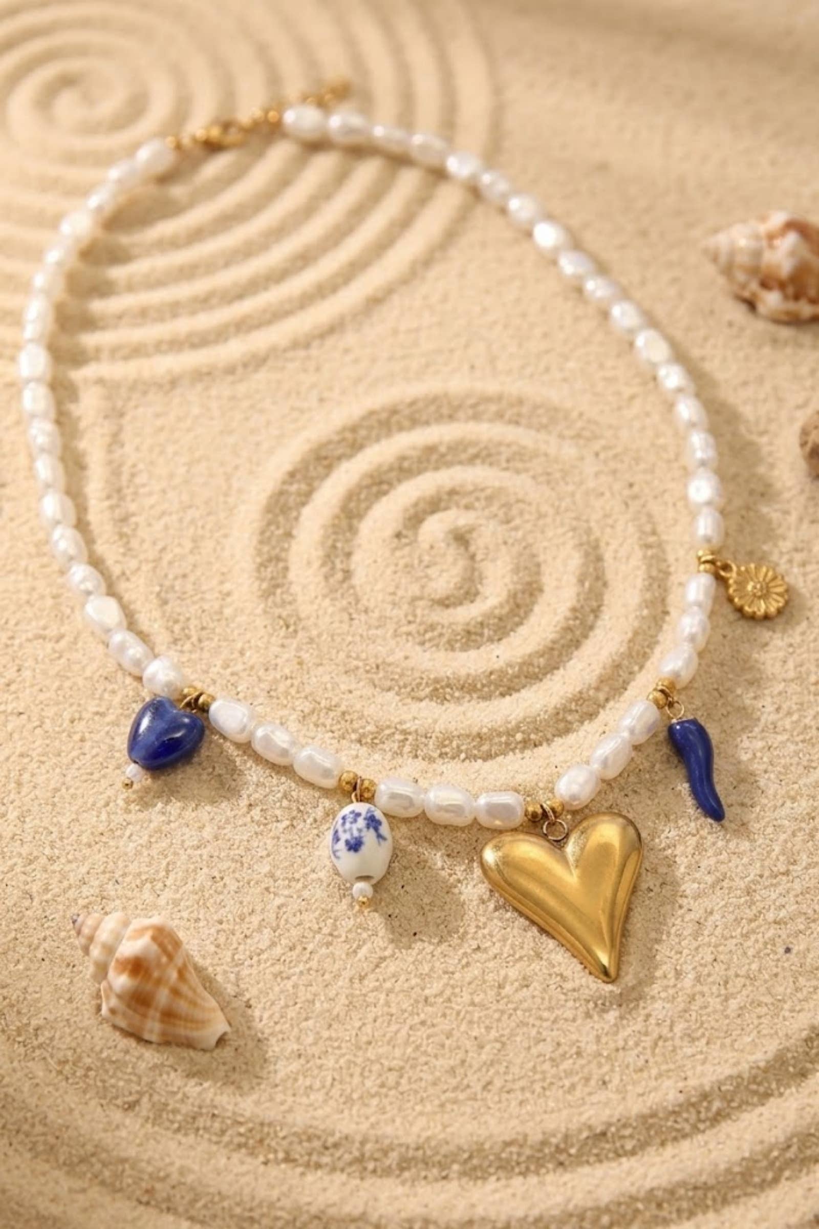 Parelketting met hartbedel – blauw