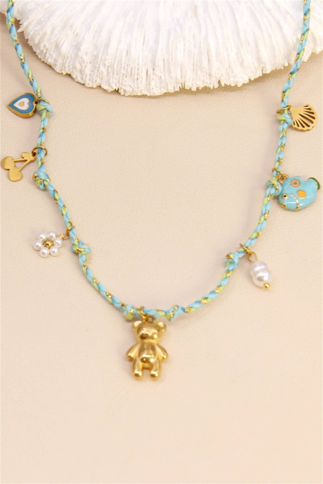 Stoffen ketting met bedels
