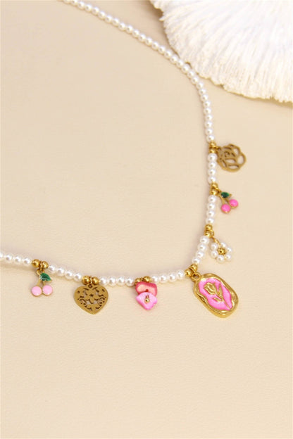 Parelketting met rozenbedels