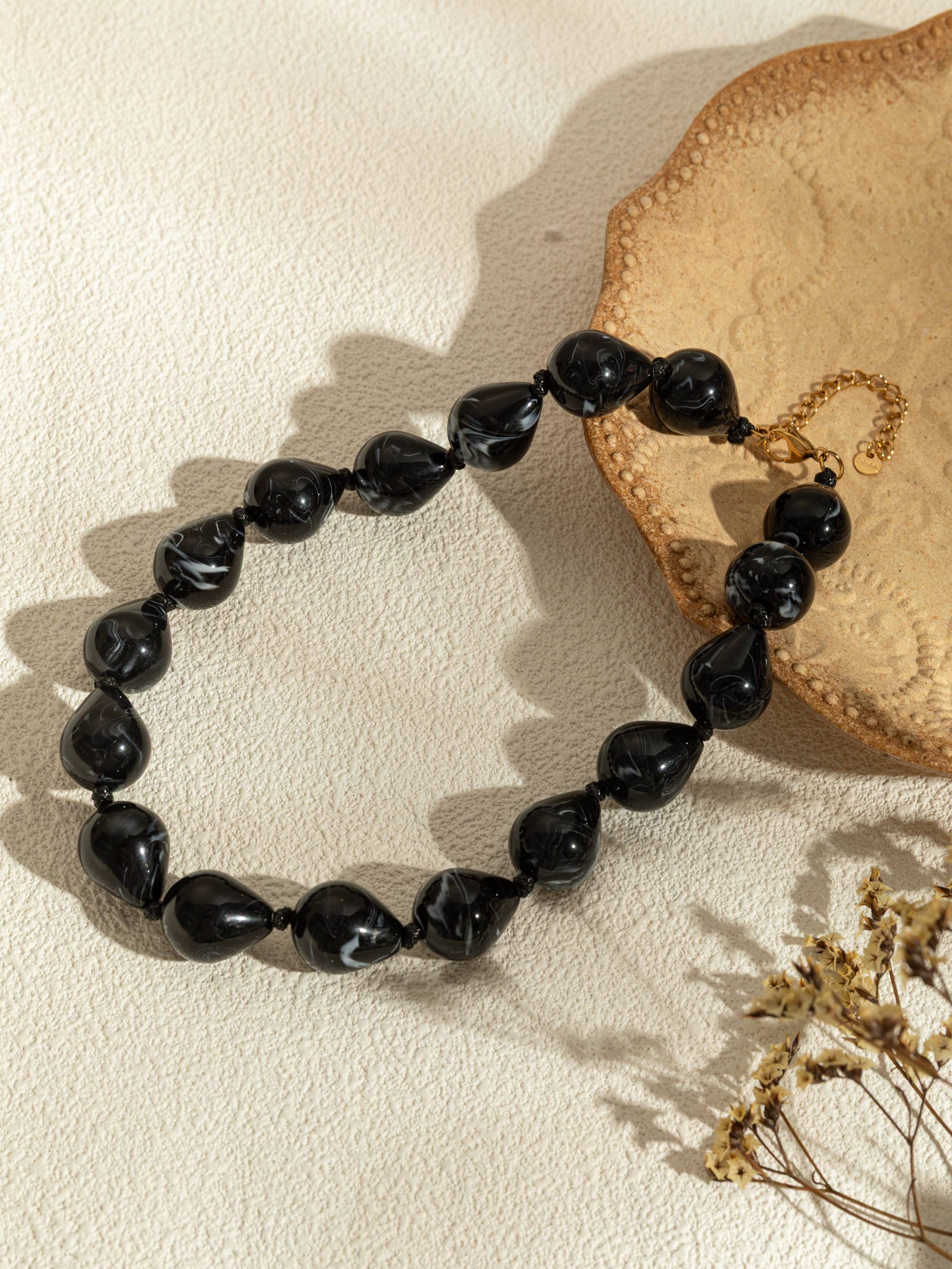 Harsdruppelkettingen in kleur met chique vergulde stalen ketting