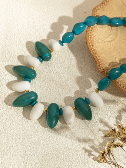 Ovale harskettingen in kleur met een chique gouden ketting