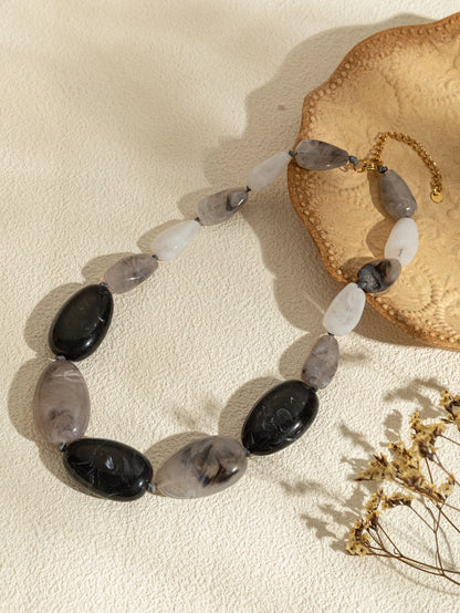 Ovale Halsketting van hars in verschillende kleuren