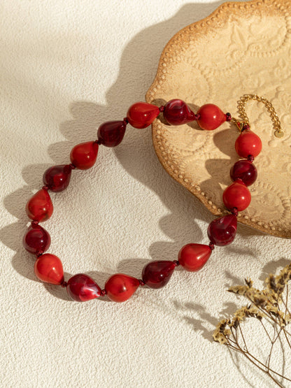 Harsdruppelkettingen in kleur met chique vergulde stalen ketting